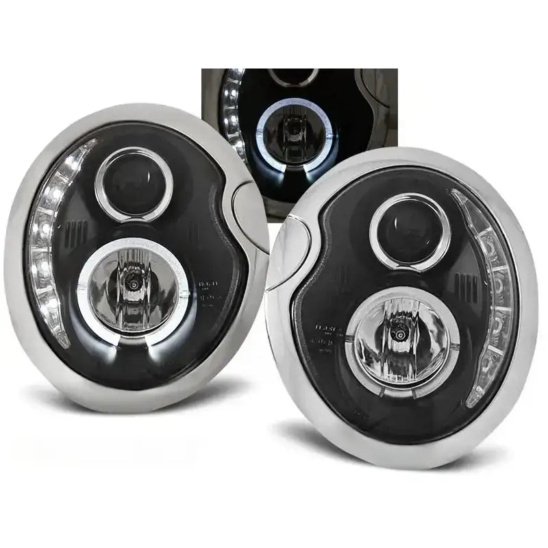 Frontlykter Mini Cooper 05.01-10.06 Black med LED-stripe og sølv-svart innramming, sett forfra.