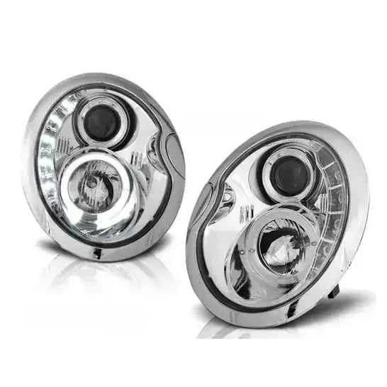 Hovedlykter Mini Cooper 05.01-10.06 i krom med klare linser og LED-detaljer, vist fra skrå forside.