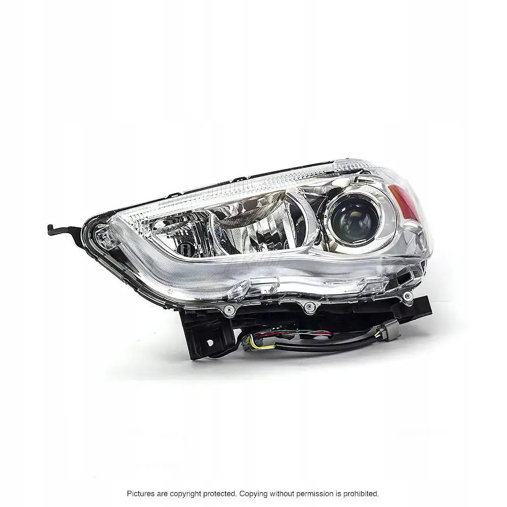 Hovedlykter Mitsubishi ASX 10-12 H11 med klart glass, sølv innside og synlige ledninger og festebraketter.