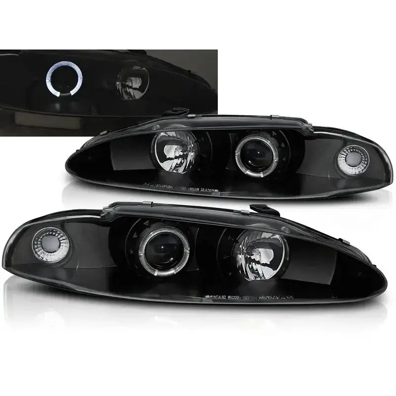 Frontlykter Mitsubishi Eclipse 06.95-96 Angel Eyes Black med to runde linser og LED-lysringer, sett forfra.