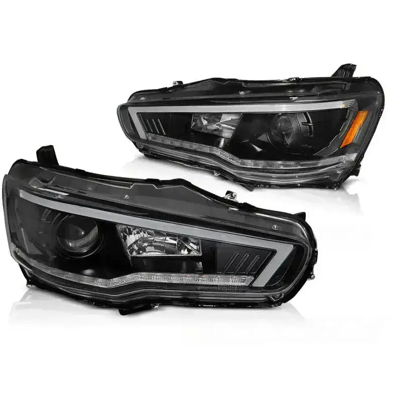 Frontlykter Mitsubishi Lancer 08- LED Black SEQ med sorte hus, LED-striper og oransje refleks.
