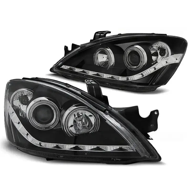 Hovedlykter Mitsubishi Lancer 7 04-07 Black med LED-striper og kromdetaljer, skrå vinkel.