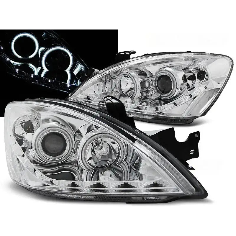 Frontlykter Mitsubishi Lancer 7 04-07 chrome sett fra skrå vinkel med detaljert reflektordesign.