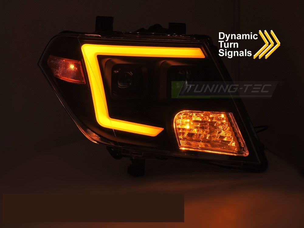 Nissan Frontier frontlykter svart hus med LED tube-design montert