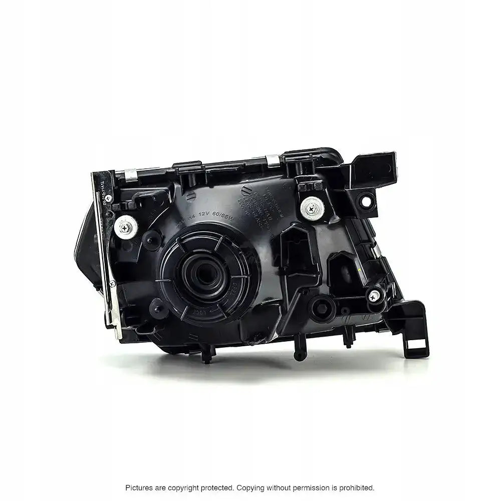 Headlamp bakside av Nissan Patrol Y61 frontlykt 97-03 med synlige monteringspunkter og metallskruer.