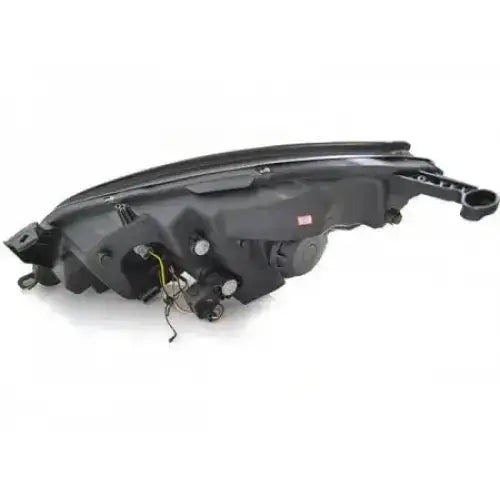 Hovedlys Opel Astra J Tube Light Black bakside med synlige tilkoblinger og ledninger, skrå vinkel.