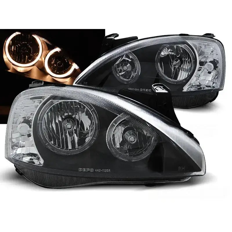 Frontlykter Opel Corsa C Angel Eyes Black med kromdetaljer, sett fra skrå vinkel og LED-lysringer.