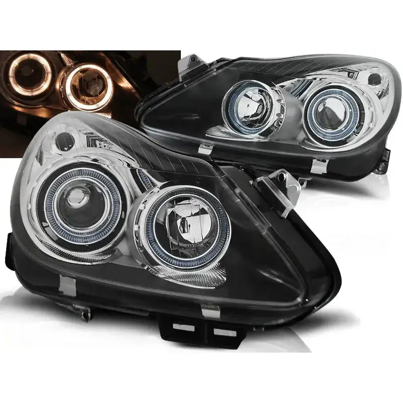 Frontlykter Opel Corsa D Angel Eyes Black med LED-lysringer, vist fra skrå vinkel, detaljbilde i hjørnet.