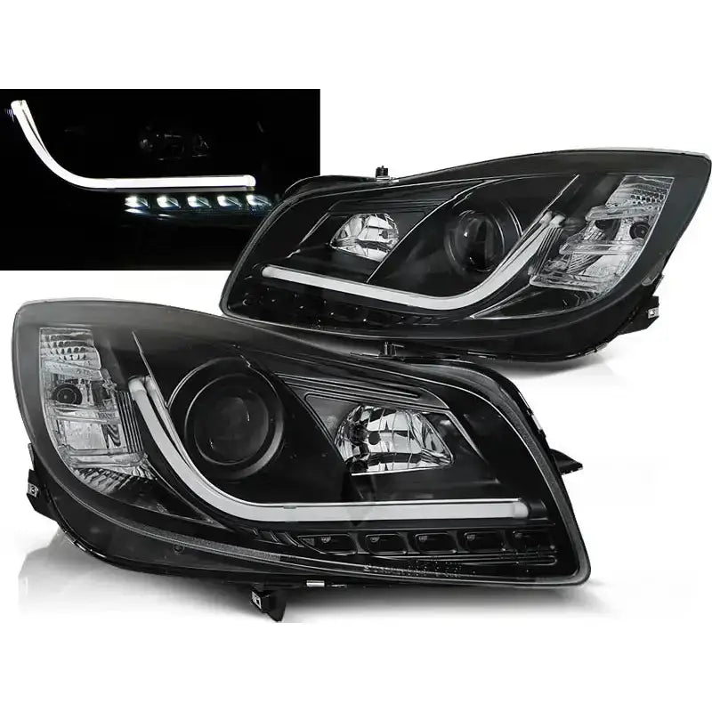 Frontlykter Opel Insignia 08-12 Black Tube Lights med svart hus og LED-lysstriper sett fra skrå vinkel.