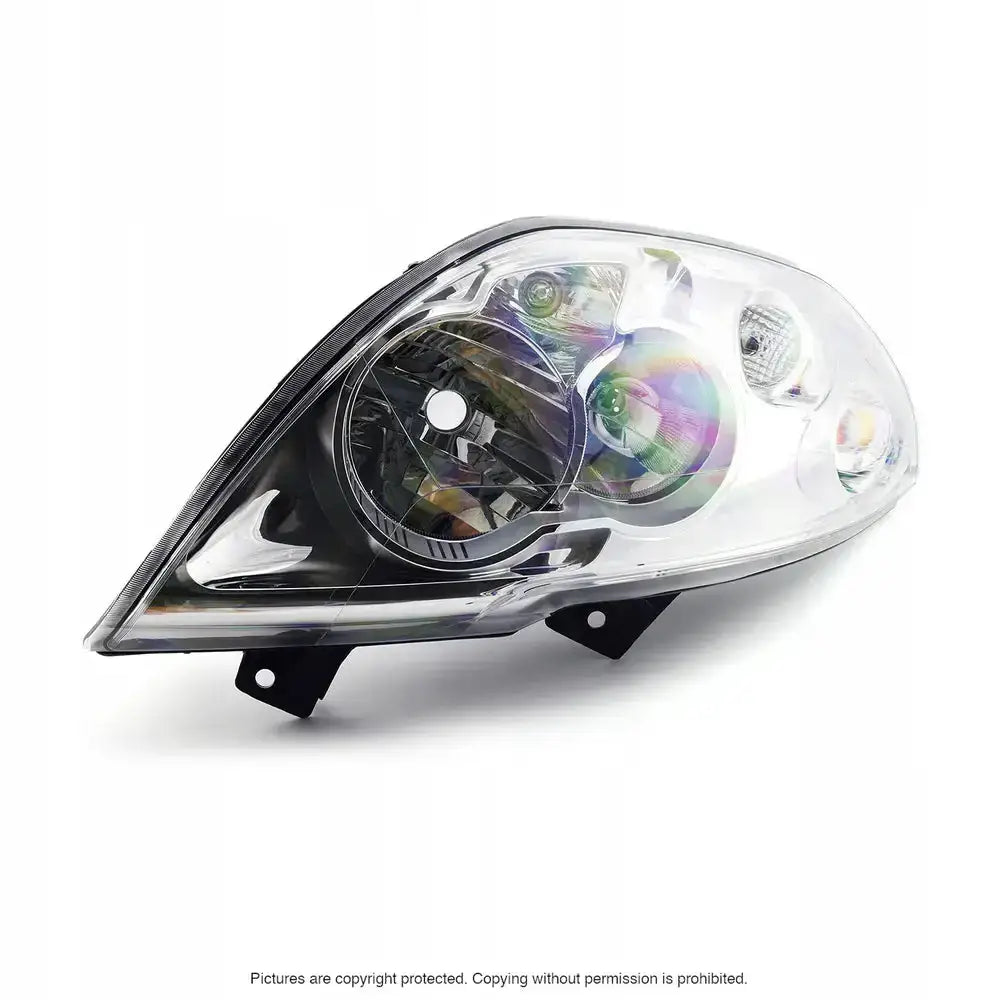Hovedlys Opel Movano 10- H1/H7 sett skrått forfra med klart glass og synlige reflektorer.
