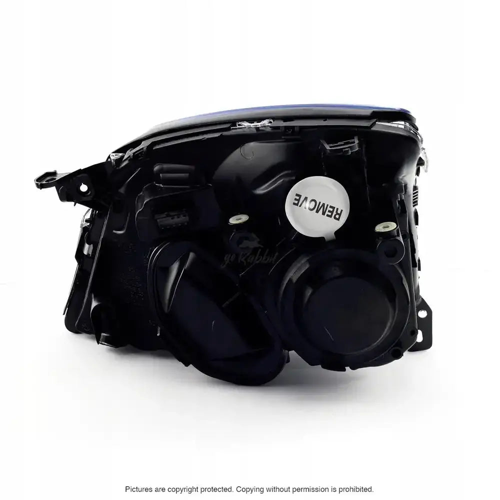 Hovedlykter Opel Signum 02-05 H7 Chrome sett fra baksiden med deksler og hvit hette mot hvit bakgrunn.