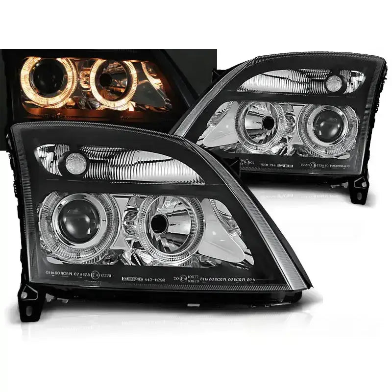 Frontlykter Opel Vectra C Angel Eyes Black med klare linser og svarte detaljer, LED-ringer lyser gult.