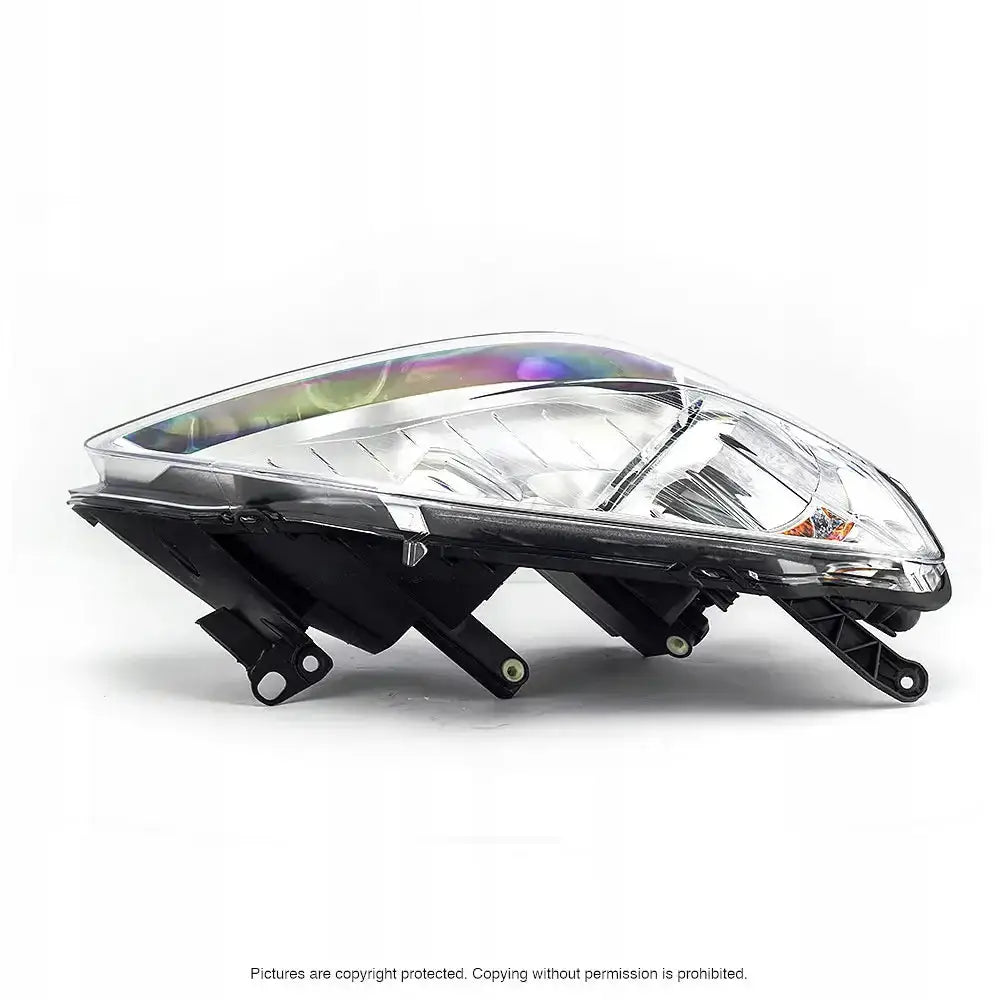 Frontlykter Opel Zafira B 08-11 H1/H7 sett fra siden med klar plast og sølv innside.