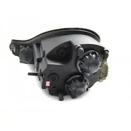 Headlights Porsche Boxster 96-04 /911 996 Daylight Black sett fra skrå vinkel, plast og metall.