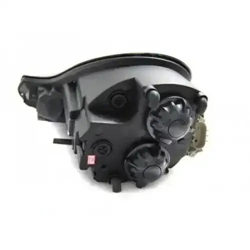 Headlights Porsche Boxster 96-04 Daylight Chrome sett fra skrå vinkel med runde justeringshjul.