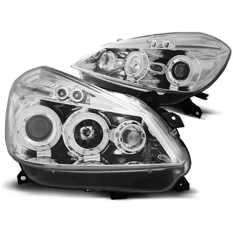 Hovedlykter Renault Clio 3 05-09 Chrome Angel Eyes med klart glass og svart innfatning, sett fra siden.