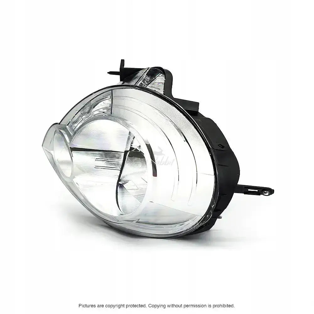 Headlights Renault Kangoo 08-13 H4 med klart glass, sorte detaljer og synlige festebraketter fra skrå front.