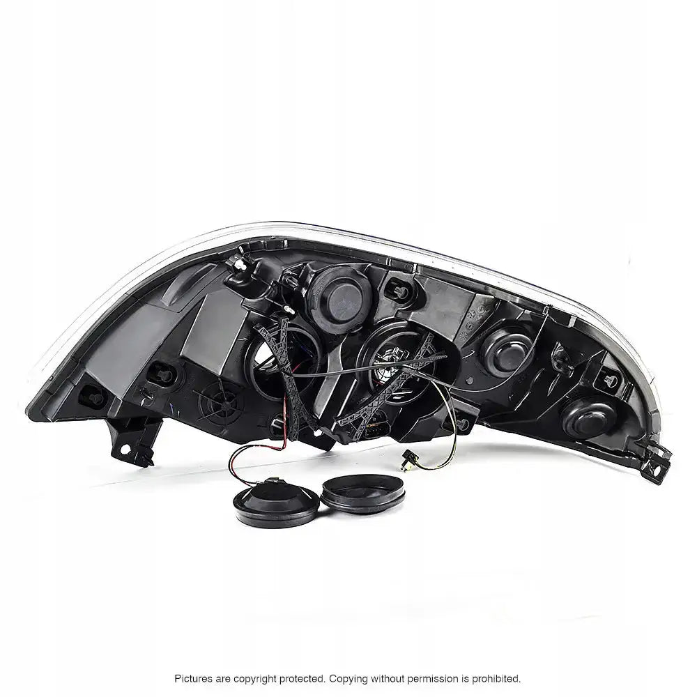 Headlamp bakside av Renault Master 10- H7 med ledninger og to avtagbare deksler i sort plast.