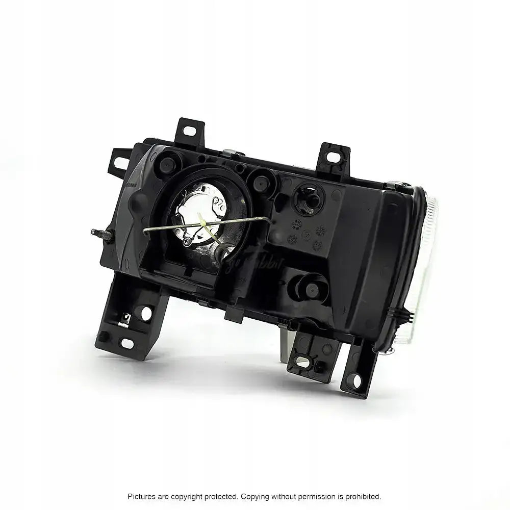 Headlights Renault Master 98-03 bakside med lampefatning, festebraketter og synlig lykteglass.