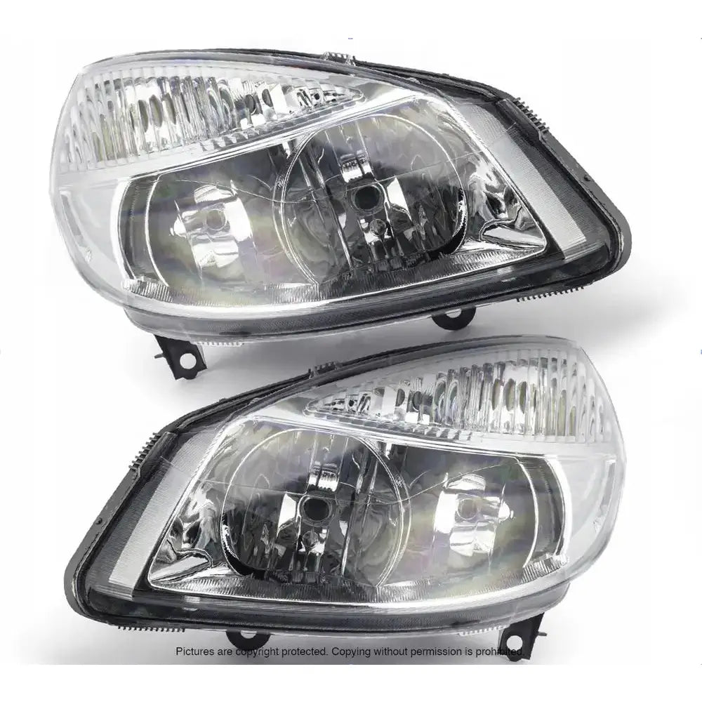 Frontlykter Renault Scenic 03-09 med klart glass, sorte kanter og doble reflektorer, sett forfra.