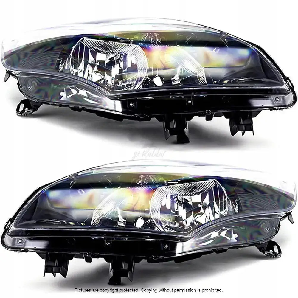 Frontlykter Renault Scenic 09-12 H7, to klare frontlykter med sorte detaljer sett forfra mot hvit bakgrunn.