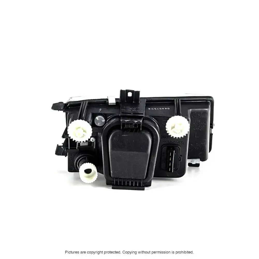 Headlamp Seat Cordoba 1 93-02 H4 svart plast med hvite tannhjul og synlige koplingspunkter, sett forfra.