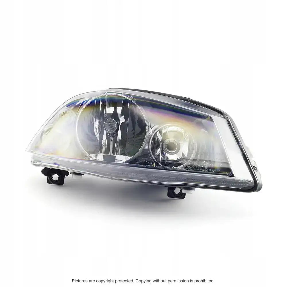 Hovedlys Seat Cordoba 2 02-09 billykt i klar plast og metall, vist fra skrå vinkel.