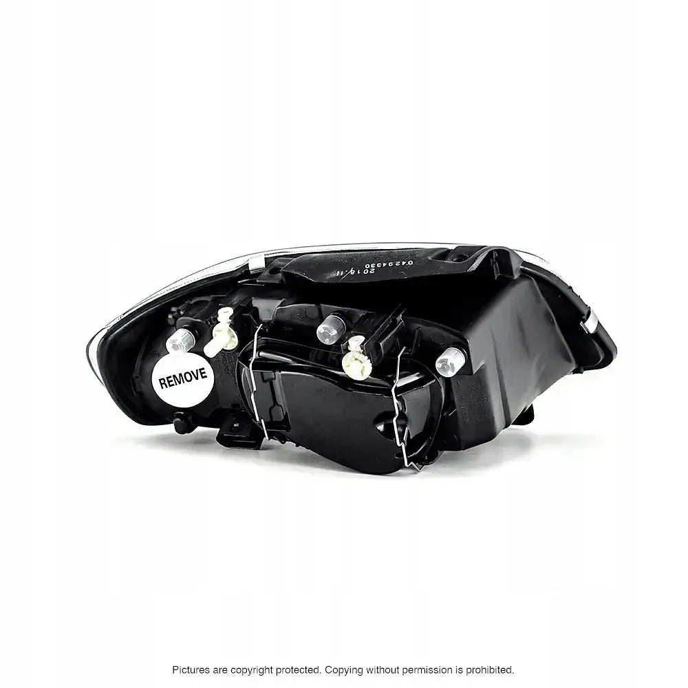 Frontlykter Seat Cordoba 99-02 sett bakfra med synlige pærer, festepunkter og hvit "REMOVE"-etikett.