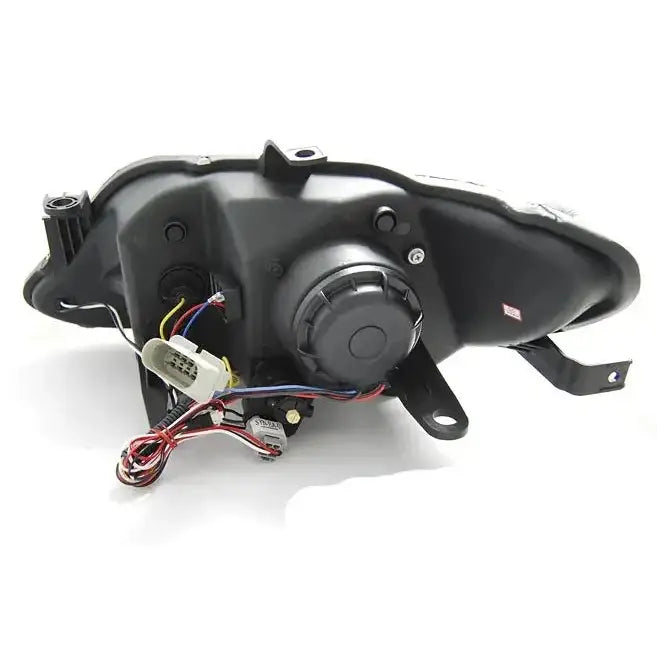 Headlamp Seat Ibiza 6J LED bakside med ledninger, kontakter og monteringspunkter i svart plast.