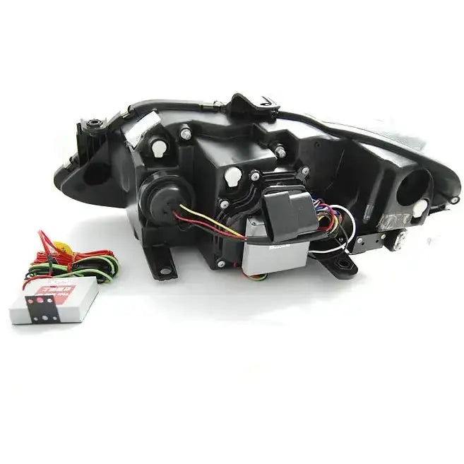 Headlamp Seat Ibiza 6J 12- Tru DRL Black sett bakfra med synlige ledninger og elektronisk boks.