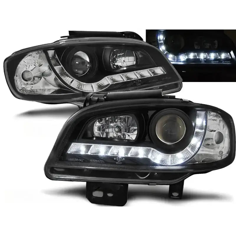 Frontlykter Seat Ibiza/Cordoba 09.99-03.02 med sort innramming og hvite LED-lys, vist skrått og tent.