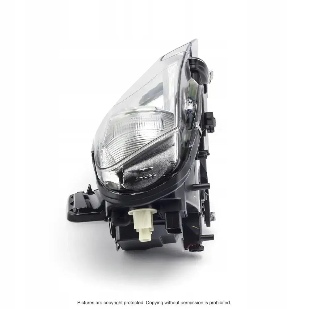 Hovedlys Skoda Superb 01-08 frontlykt med klart glass, svart plast og synlig justeringsskrue.