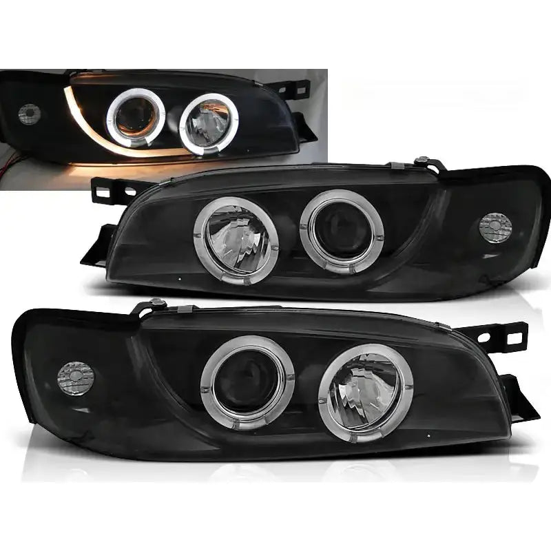 Frontlykter Subaru Impreza Angel Eyes Black med sotet glass og dobbel ringdesign, LED-lys påslått.