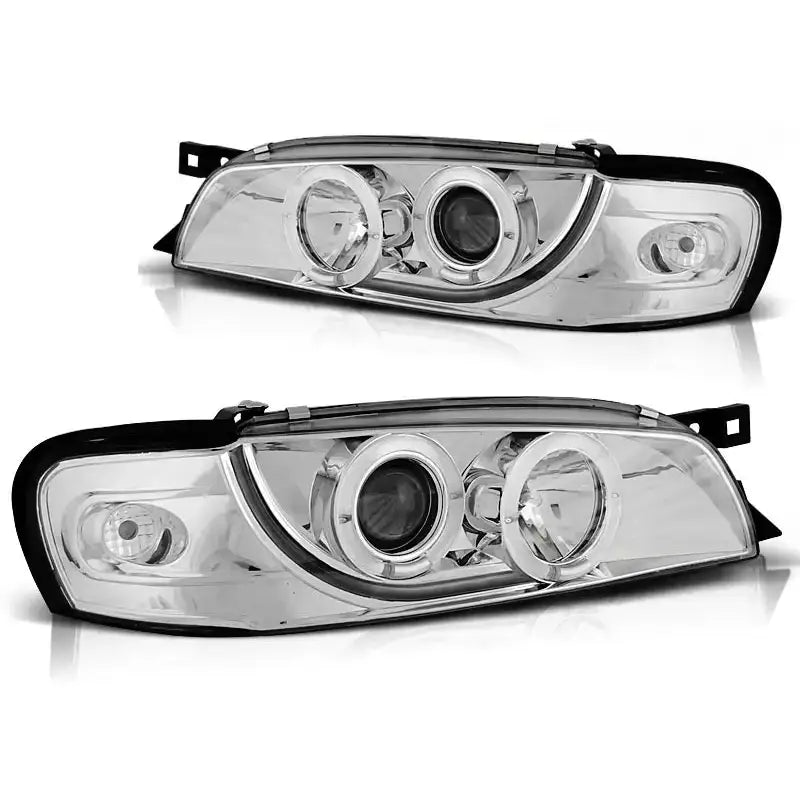 Hovedlykter Subaru Impreza 05.93-10.00 Angel Eyes Chrome med runde linser og sorte kanter mot hvit bakgrunn.