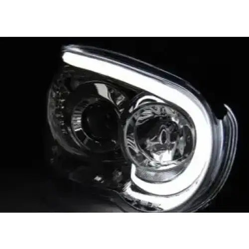 Hovedlykter Subaru Impreza II GD 03-05 Tube Light Chrome med LED-lysslynge og to runde reflektorer.