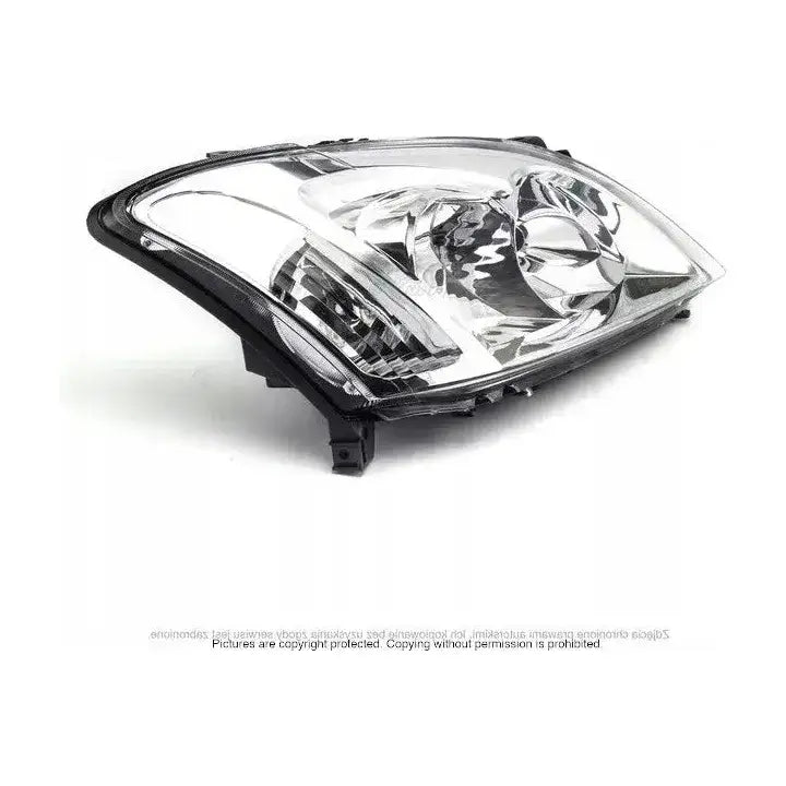 Headlights Toyota Corolla E12 02-04 vist fra skrå vinkel med synlige reflektorer og fester.