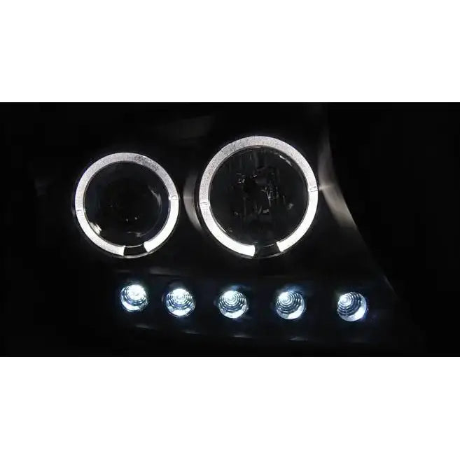 Hovedlys Toyota Land Cruiser FJ200 Angel Eyes sorte lykter med LED-lys og fem små LED-pærer i mørket.