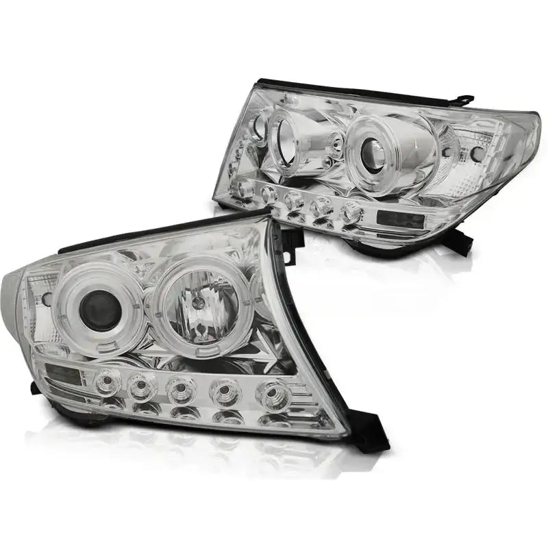 Hovedlykter Toyota Land Cruiser FJ200 Angel Eyes Chrome med klare linser og flere runde lyselementer.