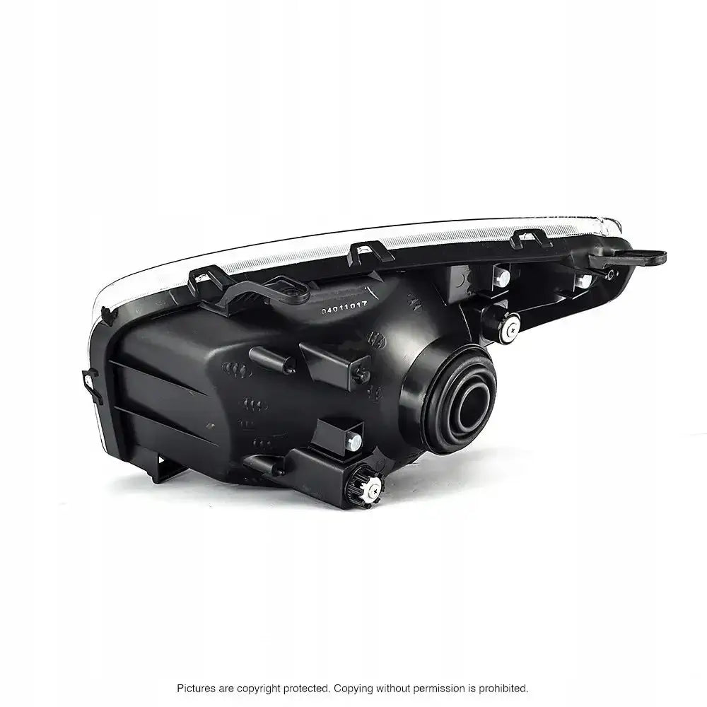 Headlamp til Toyota Rav4 00-03 H4, bakside med kontaktpunkt og festebraketter mot hvit bakgrunn.