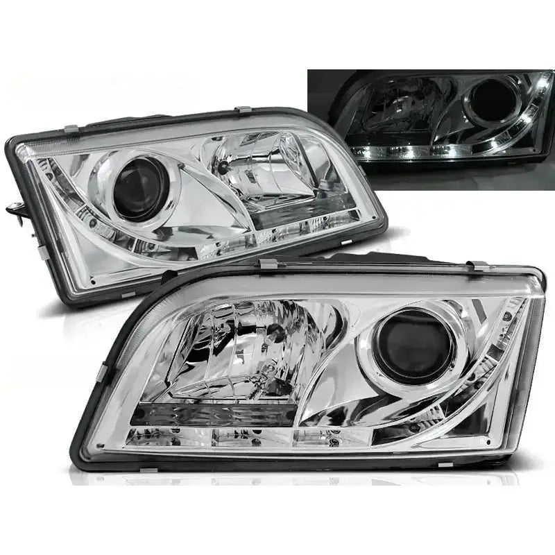 Frontlykter Volvo S40/V40 02.96-12.03 Chrome med klart glass og LED-stripe, sett forfra og fra siden.