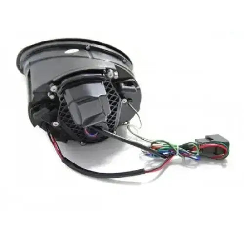 Hovedlys Vw Beetle 06-12 LED Black sett bakfra med synlig gitter, ledninger og festeskruer.