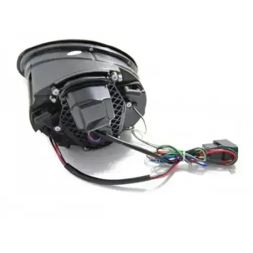 Hovedlys Vw Beetle 06-12 LED Chrome bakside med synlig vifte, gitter og elektrisk tilkobling.