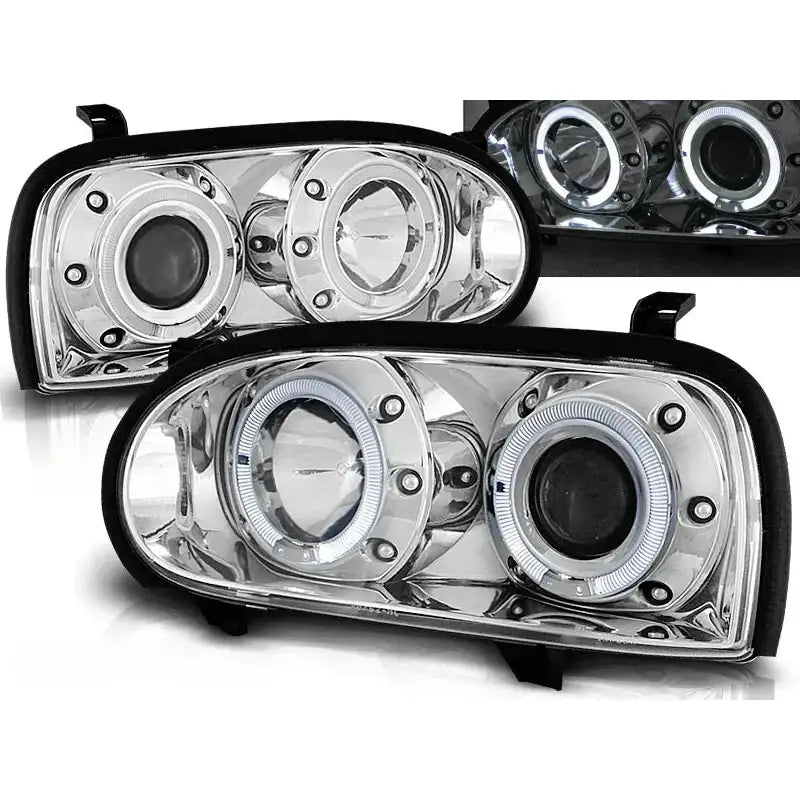Frontlykter Vw Golf 3 Angel Eyes Chrome med to runde linser og kromdetaljer, sett forfra.