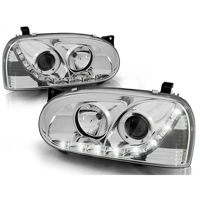 Hovedlykter Vw Golf 3 91-97 i chrome med doble hovedlys og LED-lys, sett forfra i vinkel.