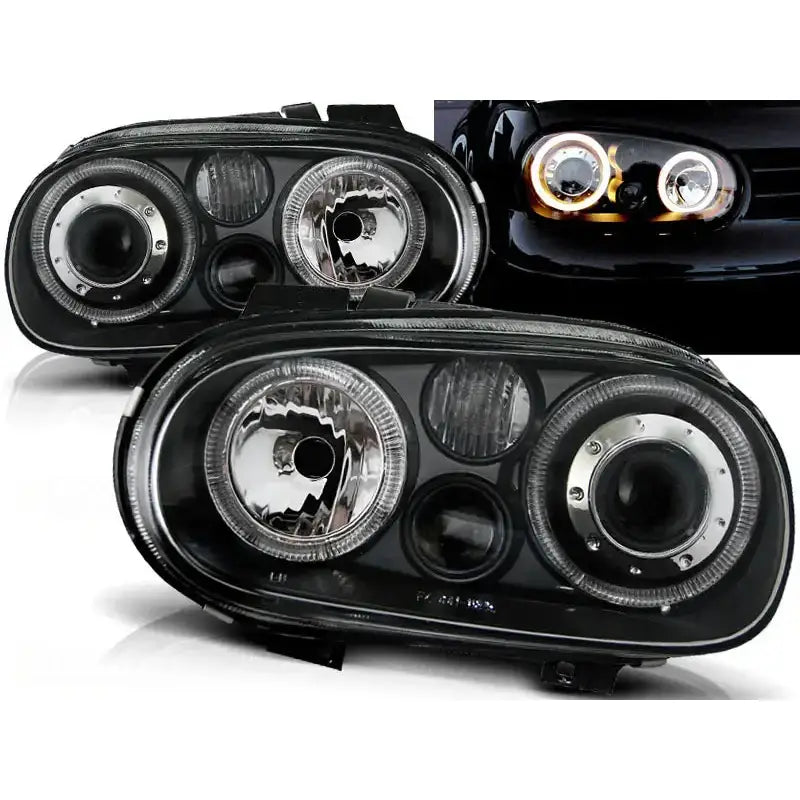 Frontlykter Vw Golf 4 Angel Eyes Black med klart glass og sorte detaljer, vist forfra med lyssirkler tent.