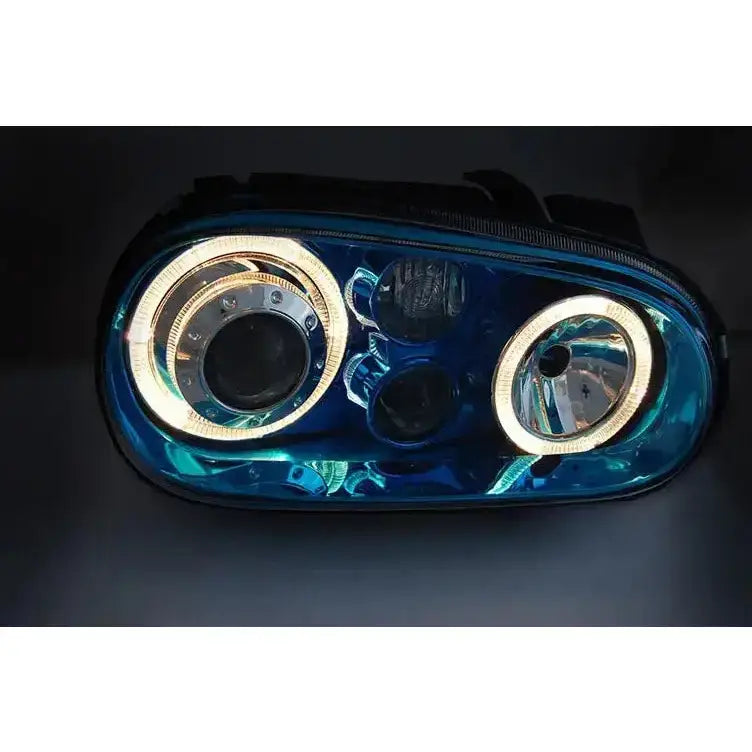 Hovedlykter Vw Golf 4 Angel Eyes Blue med blåtonet reflektor og kromdetaljer, sett forfra.