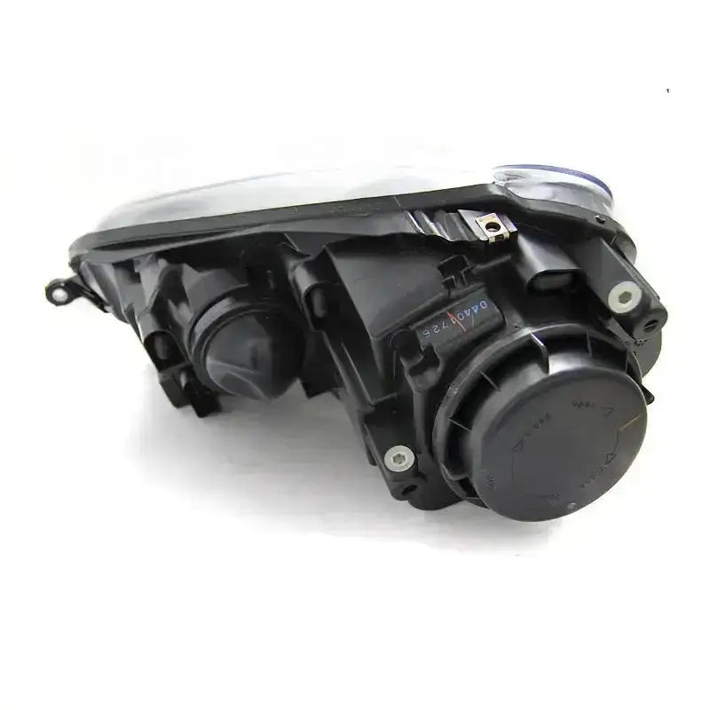 Hovedlykter Vw Golf 5 10.03-09 Black sett bakfra med runde deksler og festepunkter mot hvit bakgrunn.