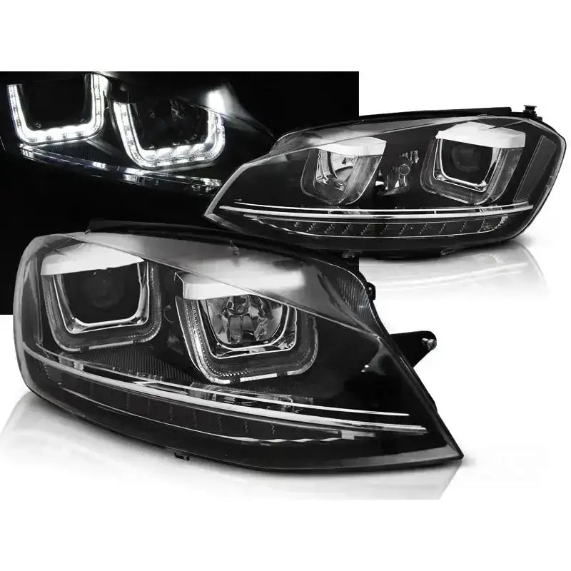 Frontlykter Vw Golf 7 U-Type Black DRL vist fra skrå vinkel med LED-lys tent i mørket.