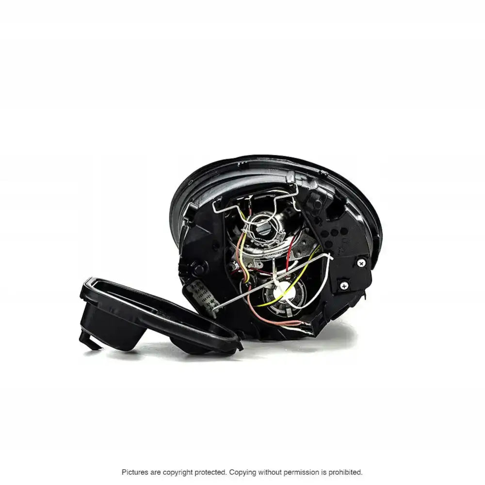 Headlamp innsiden av Vw New Beetle 05-10 frontlykt med synlige ledninger og komponenter.
