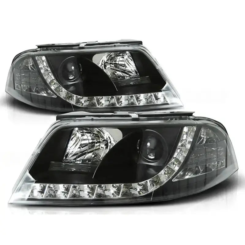 Hovedlykter Vw Passat 3BG med sotet glass, LED-paneler og buet LED-stripe, sett skrått forfra.